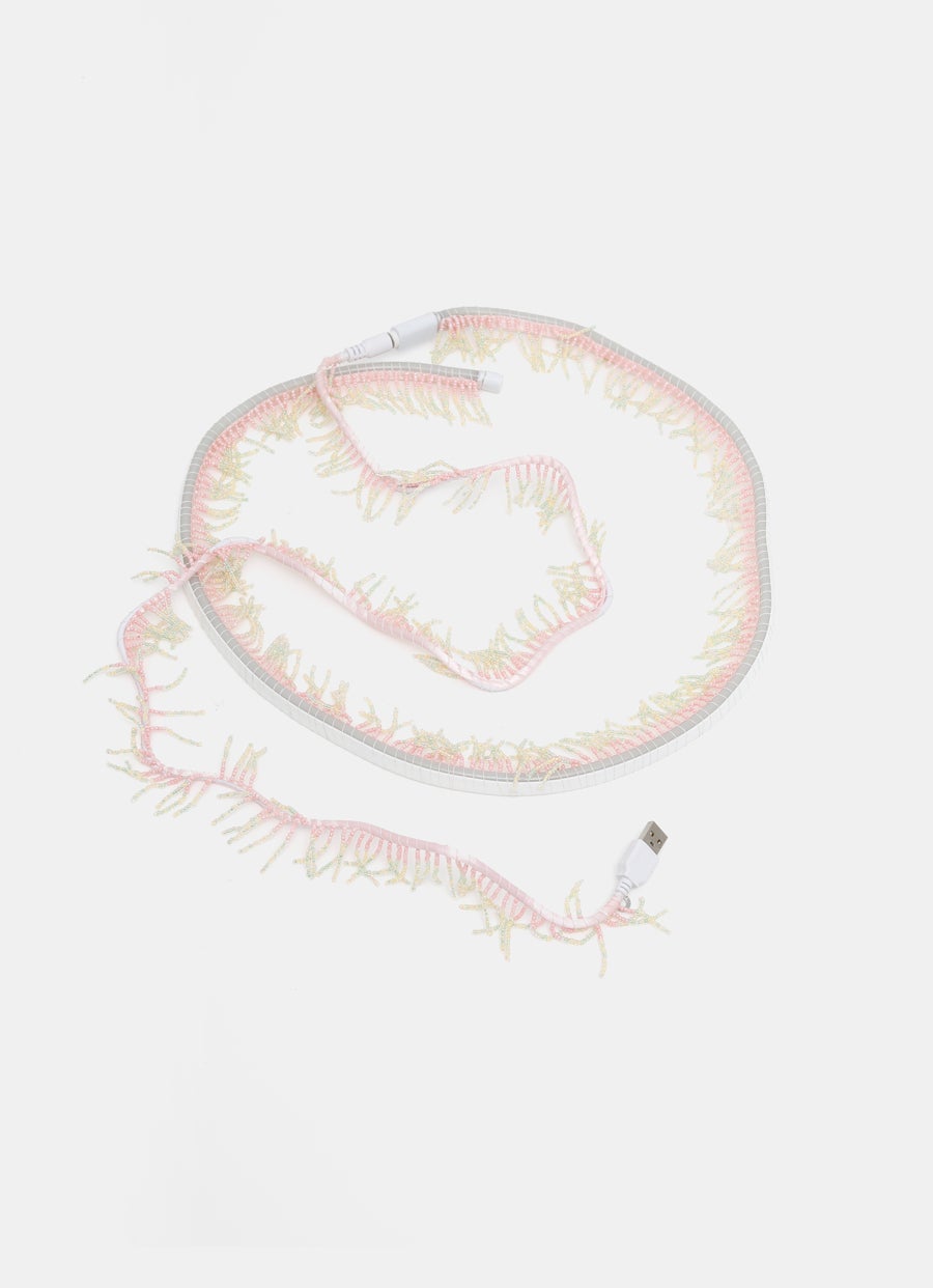 Cable luminoso con fleco de cuentas