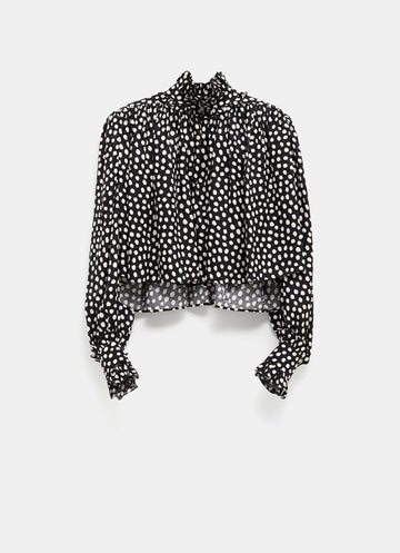 Blusa de lunares con volantes