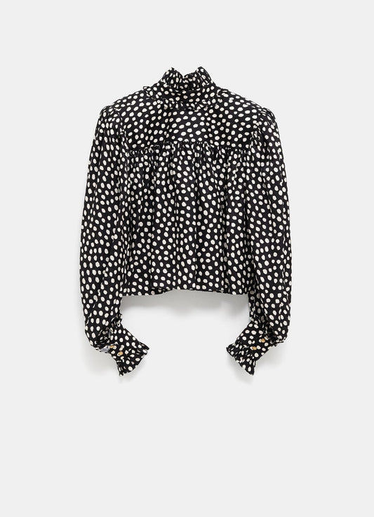 Blusa de lunares con volantes