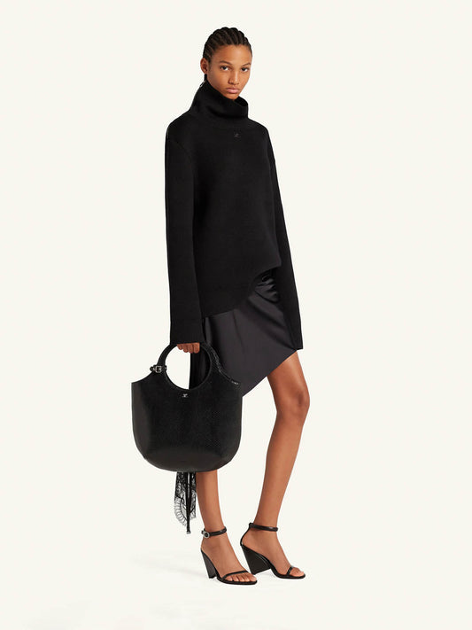 Bolso Holy de cuero efecto víbora